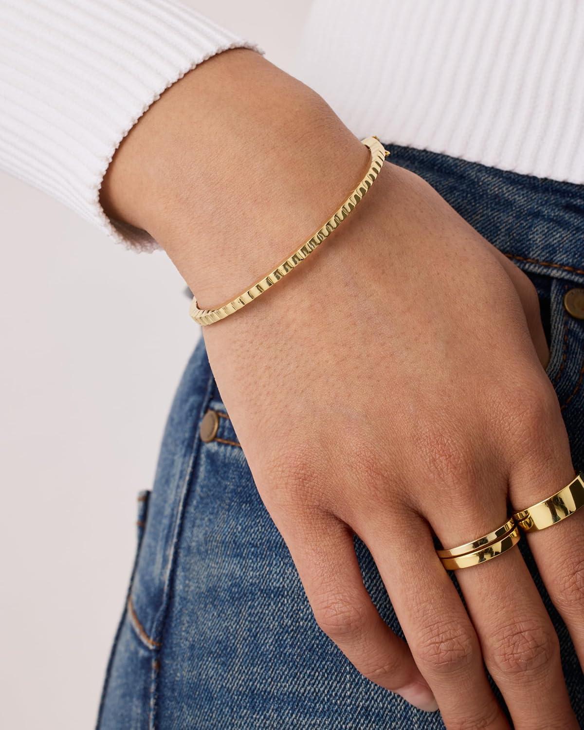 imagePAVOI 14K Gold Plated Cubic Zirconia Bangle Tennis Bracelets for Women Classic Love Cuff Bangle BraceletsYellow Gold