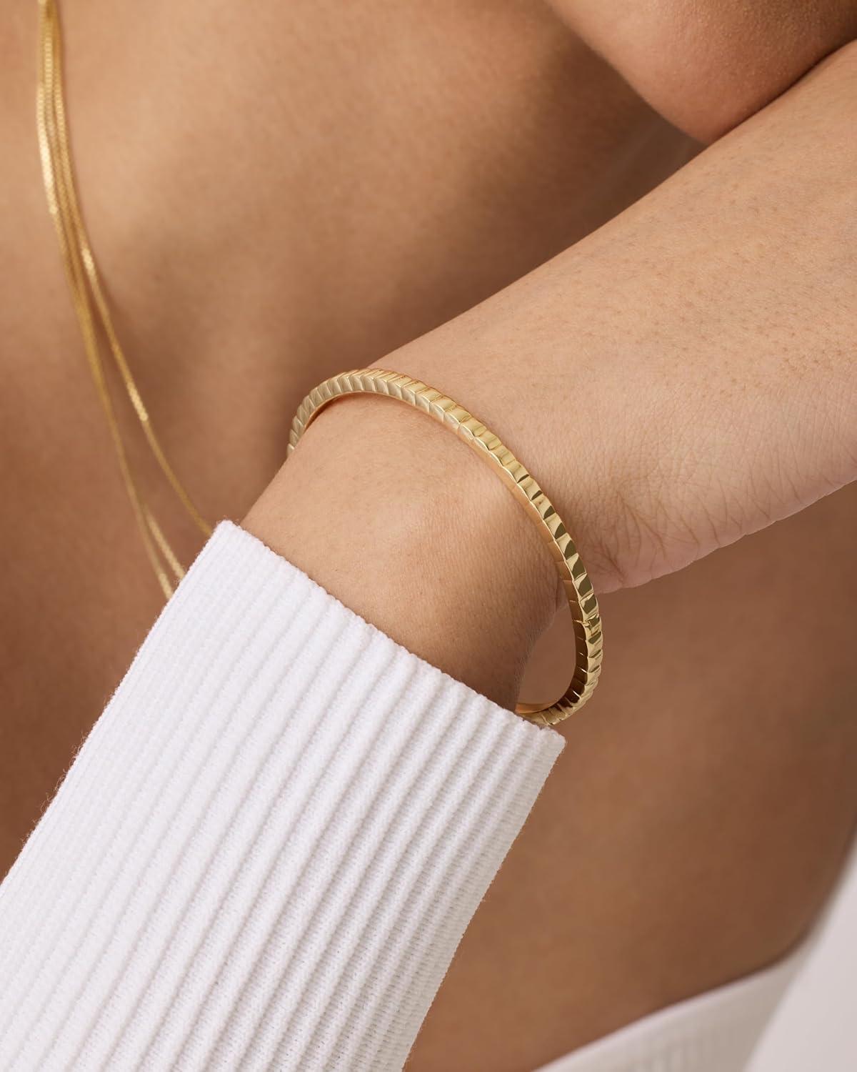 imagePAVOI 14K Gold Plated Cubic Zirconia Bangle Tennis Bracelets for Women Classic Love Cuff Bangle BraceletsYellow Gold