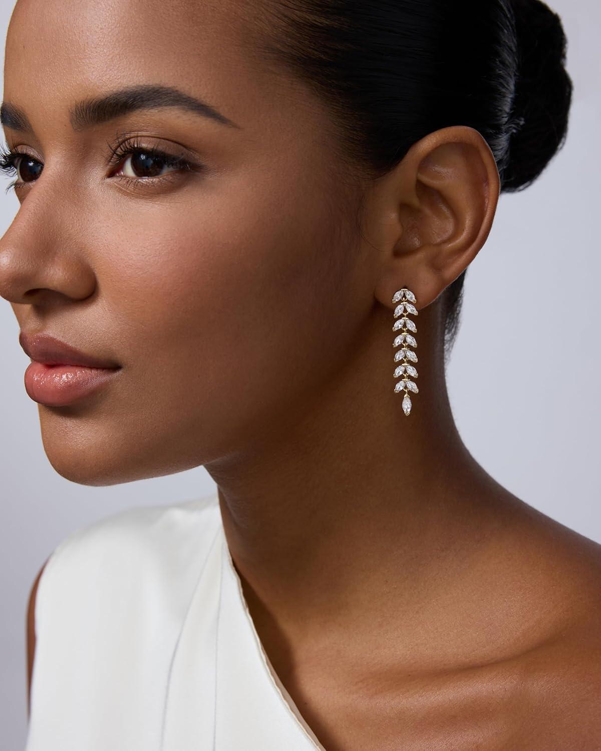 imagePAVOI 14K Gold Plated Cubic Zirconia Dangle Earrings for Women Crystal Long Bridal Drop Earrings Hypoallergenic Simulated Diamond Drop Dangle Wedding Jewelry for Brides and BridesmaidYellow Gold