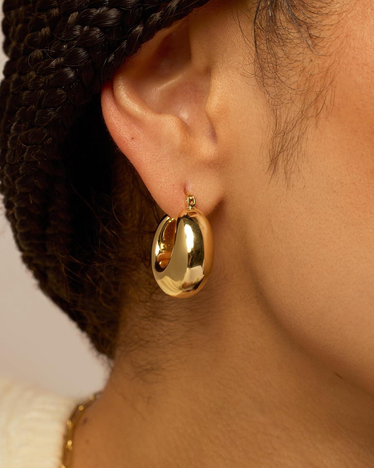 imagePAVOI 14K Gold Plated 925 Sterling Silver Posts Oval Chunky Hoop Earrings for Women Trendy Statement Thick Gold Hoops Lightweight Dangle EarringsYellow Gold