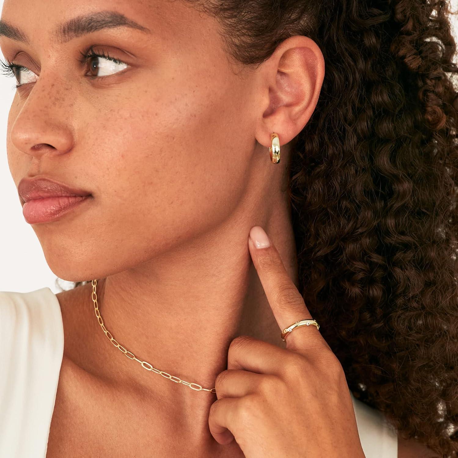 imagePAVOI 14K Gold Plated Cubic Zirconia Rings for Women Classic Stackable Ring Band for WomenYellow Gold